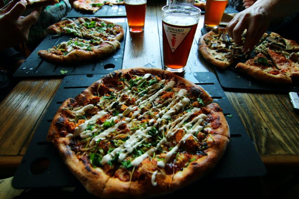 Why does beer go so well with pizza?